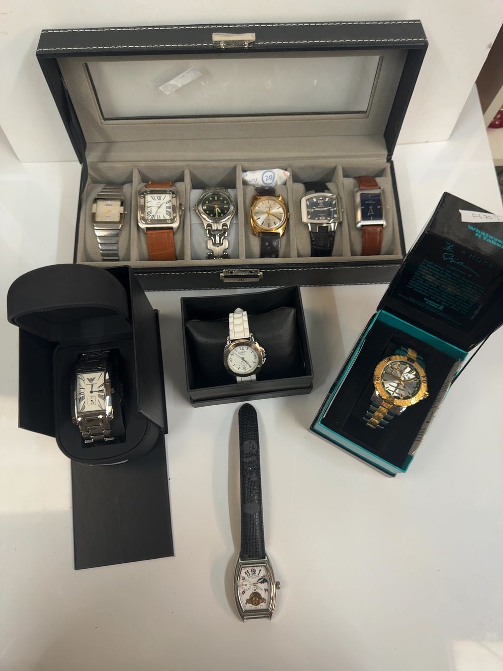Lot 302: A Collection of Ten Wristwatches Including Rado, Emporio Armani, Giorgio Armani, and Smiths Examples