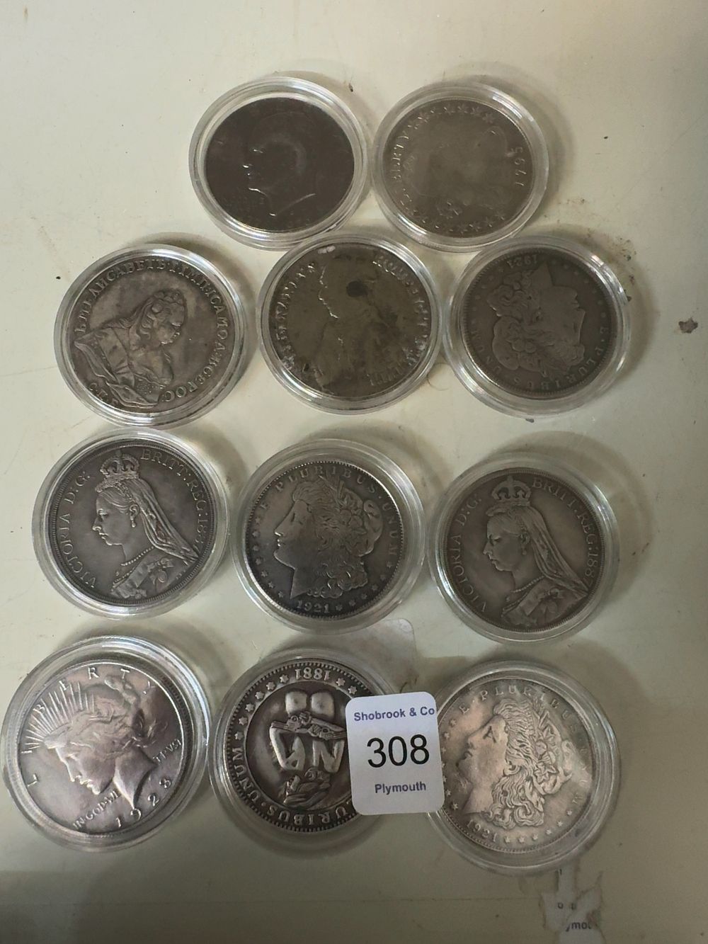 Lot 308: A Collection of Eleven Replica Silver style Coins and Medals Including US Morgan Dollars