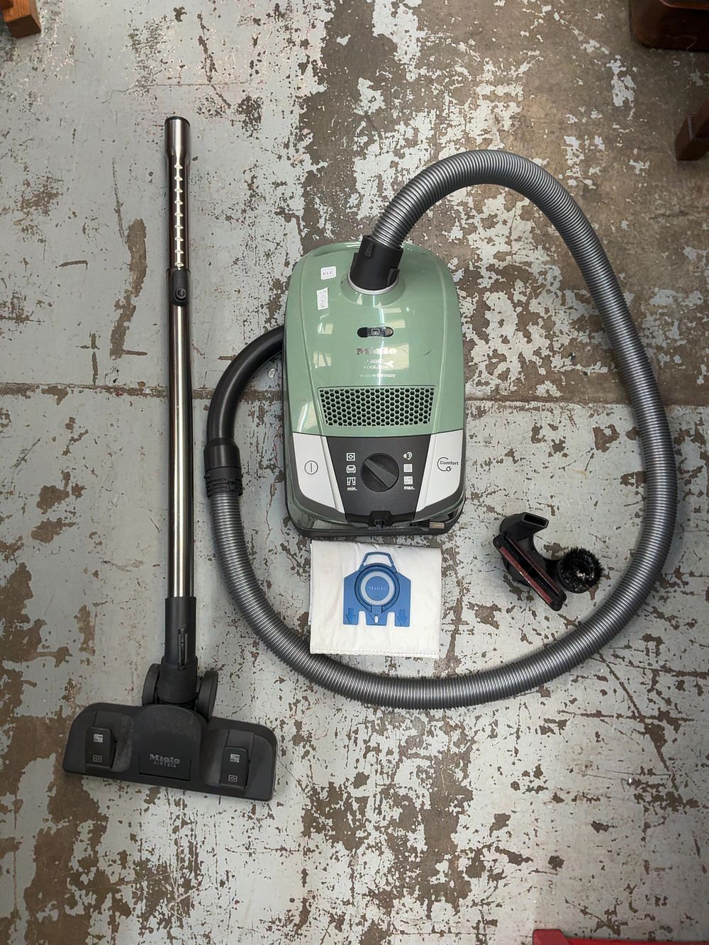 Lot 314: A Miele S6240 EcoLine Bagged Canister Vacuum Cleaner with Accessories