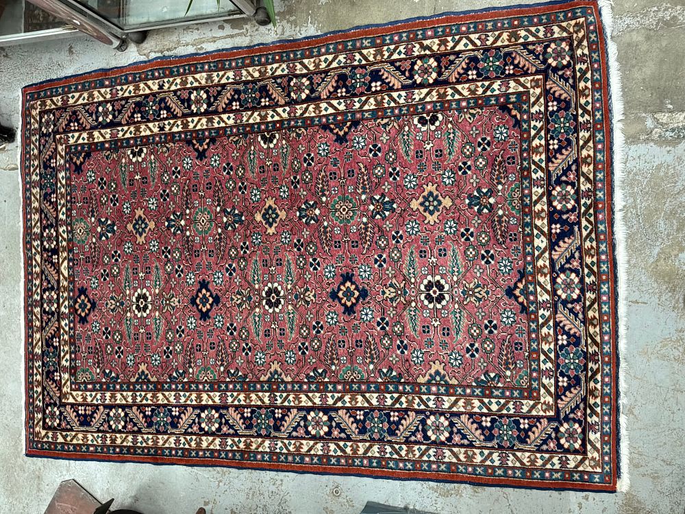 Lot 327: An Anatolian Kalender Carpets Ltd Hand Knotted Wool Rug