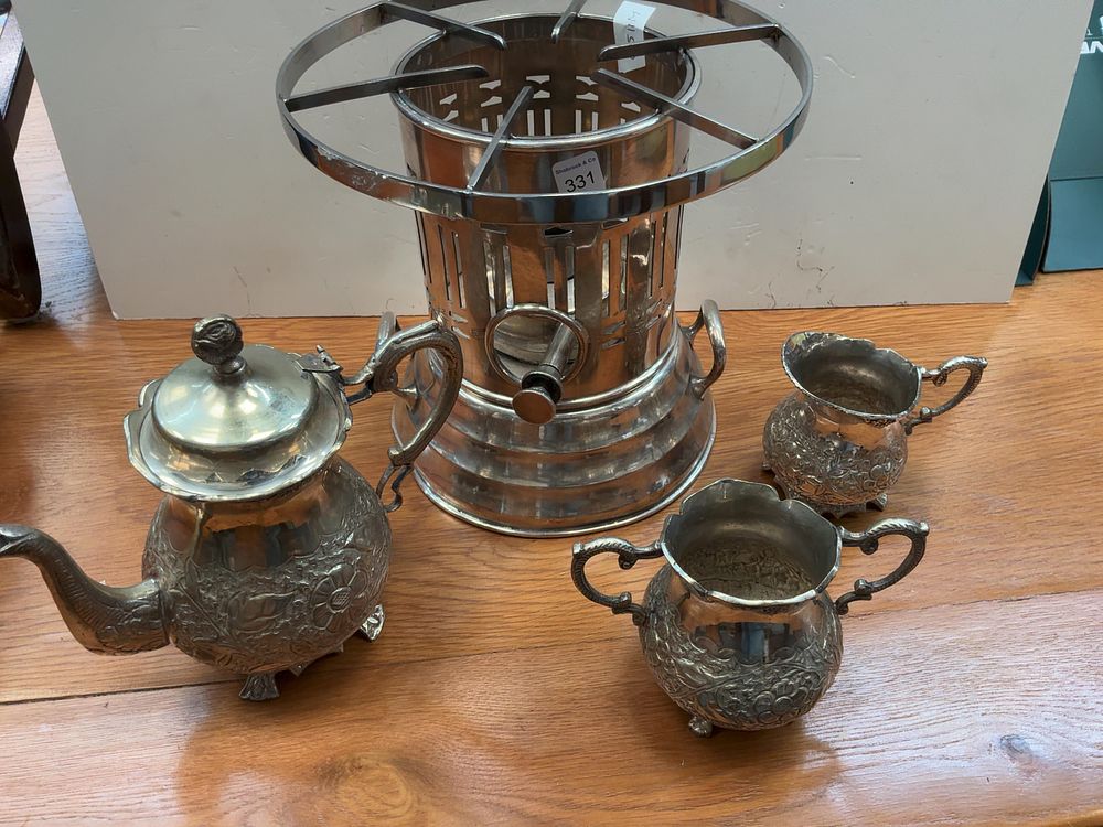 Lot 331: A Set of Four Ornate Floral Repoussé German Silver style Tea Service Items with Stand