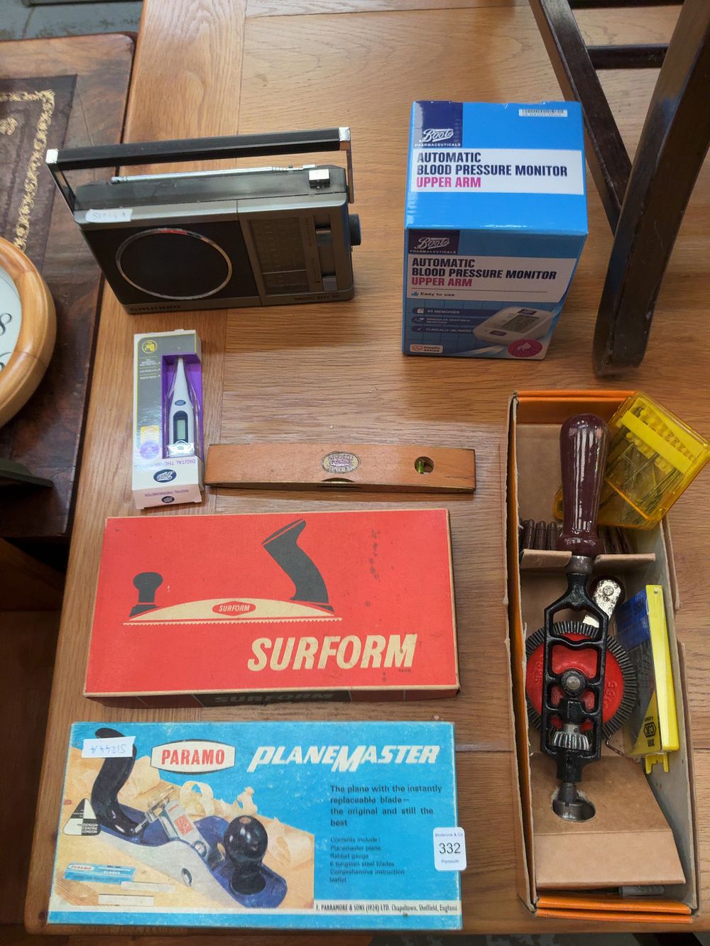 Lot 332: A Collection of Household Electronics Medical Devices and Woodworking Tools Including Grundig Boots Paramo and Surform Examples