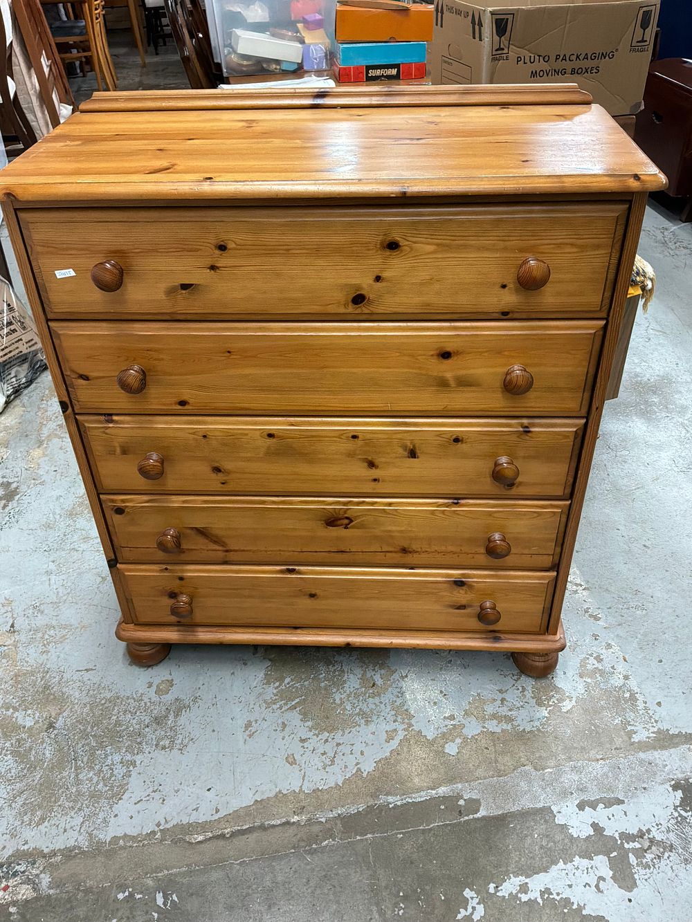 Lot 335: A Traditional Style Pine Two Over Three Chest of Drawers