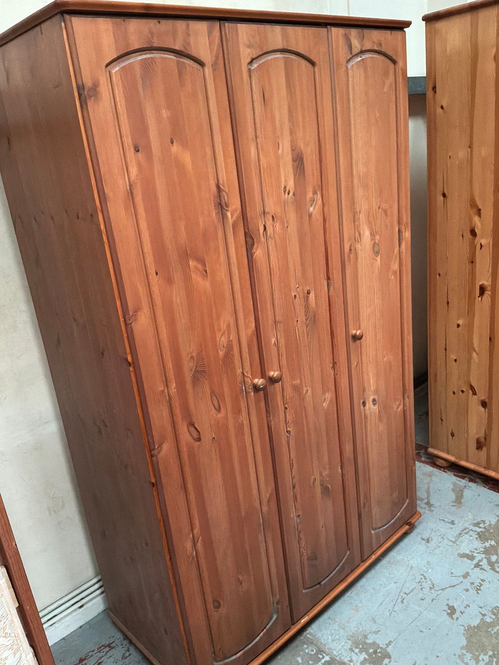 Lot 348: A Contemporary Solid Pine Triple Fall-front Storage Cabinet