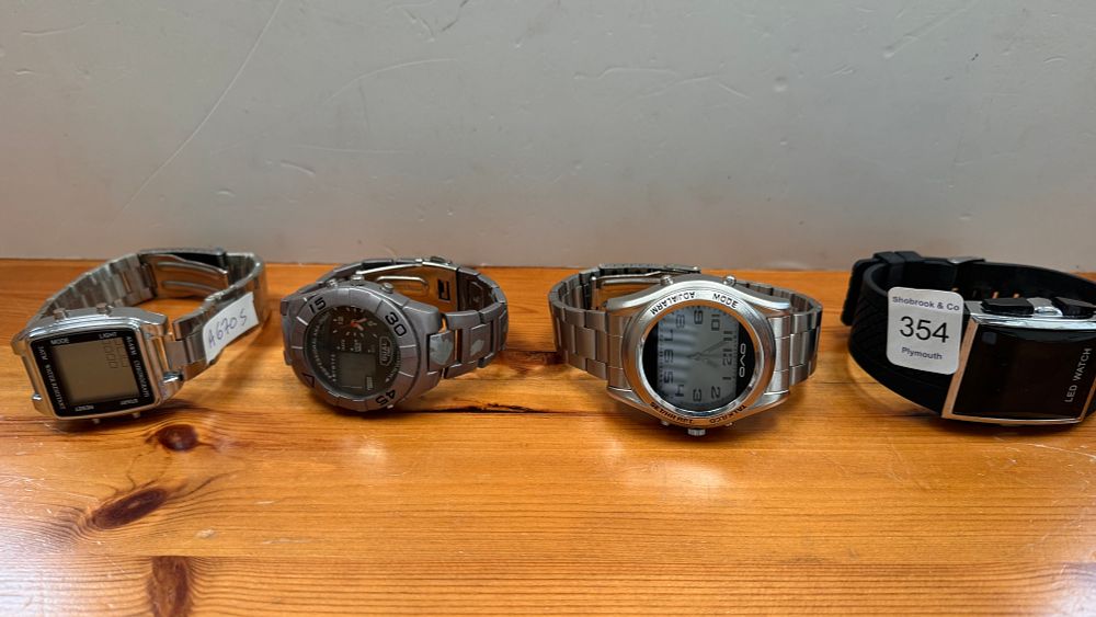 Lot 354: An Assortment of Four Contemporary Men's Wristwatches including an OVO Talking Watch