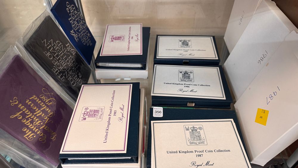 Lot 356: A Set of Eight United Kingdom Royal Mint Proof Coin Collections for 1980-1987 with Presentation Packaging