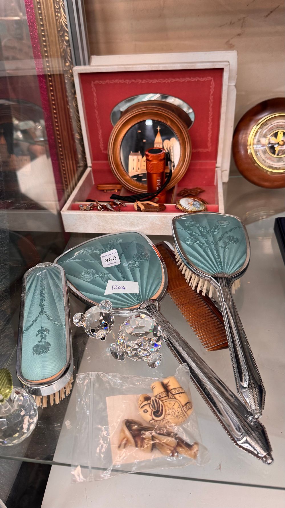 Lot 360: A Collection of Vintage Vanity Items and Decorative Collectibles including an Aneroid Barometer and Two Reproduction Netsukes