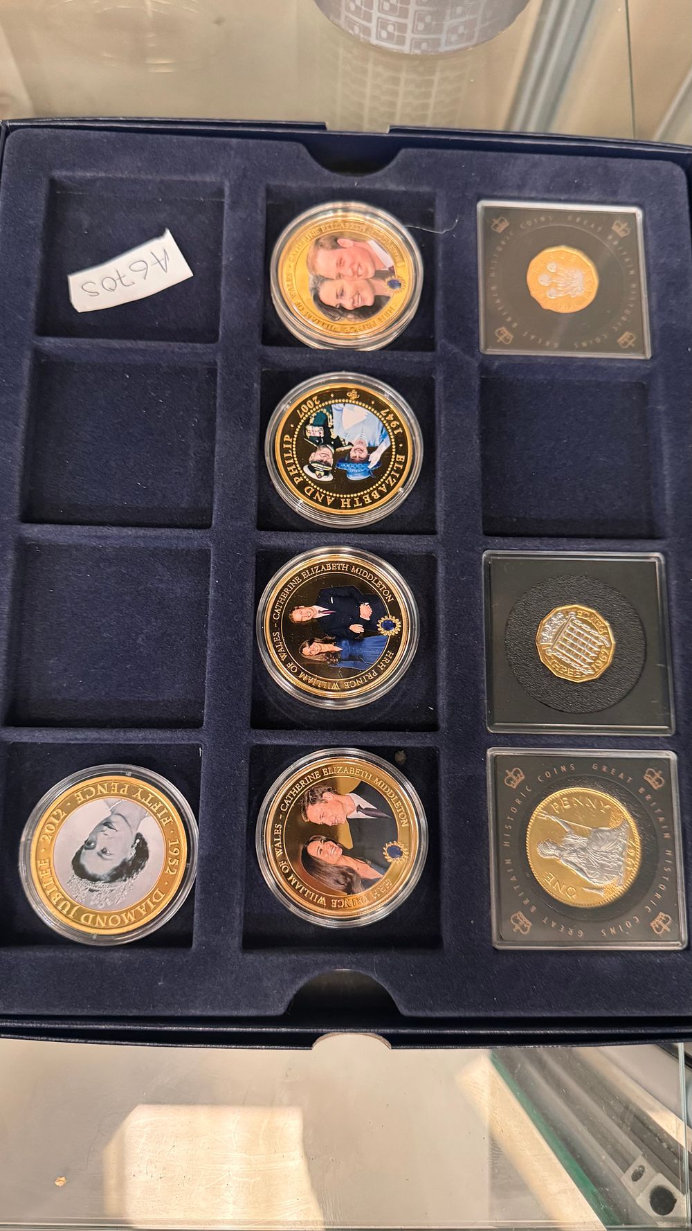 Lot 361: A Collection of Seven British Royal Family Commemorative Medals and Selective Gold-Plated Coins with Presentation Case