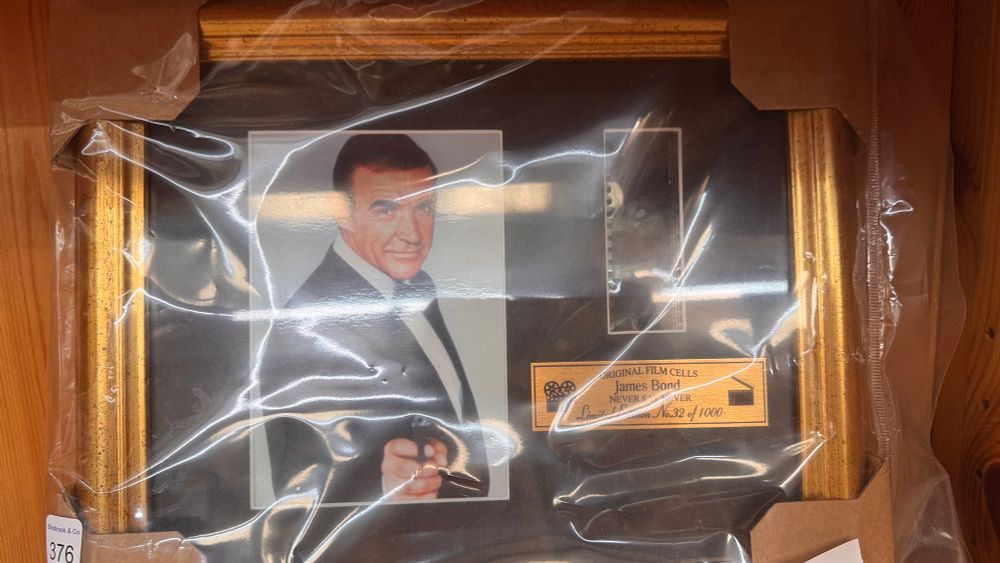 Lot 376: A Framed Global Arts LTD Never Say Never Again Film Cell Presentation
