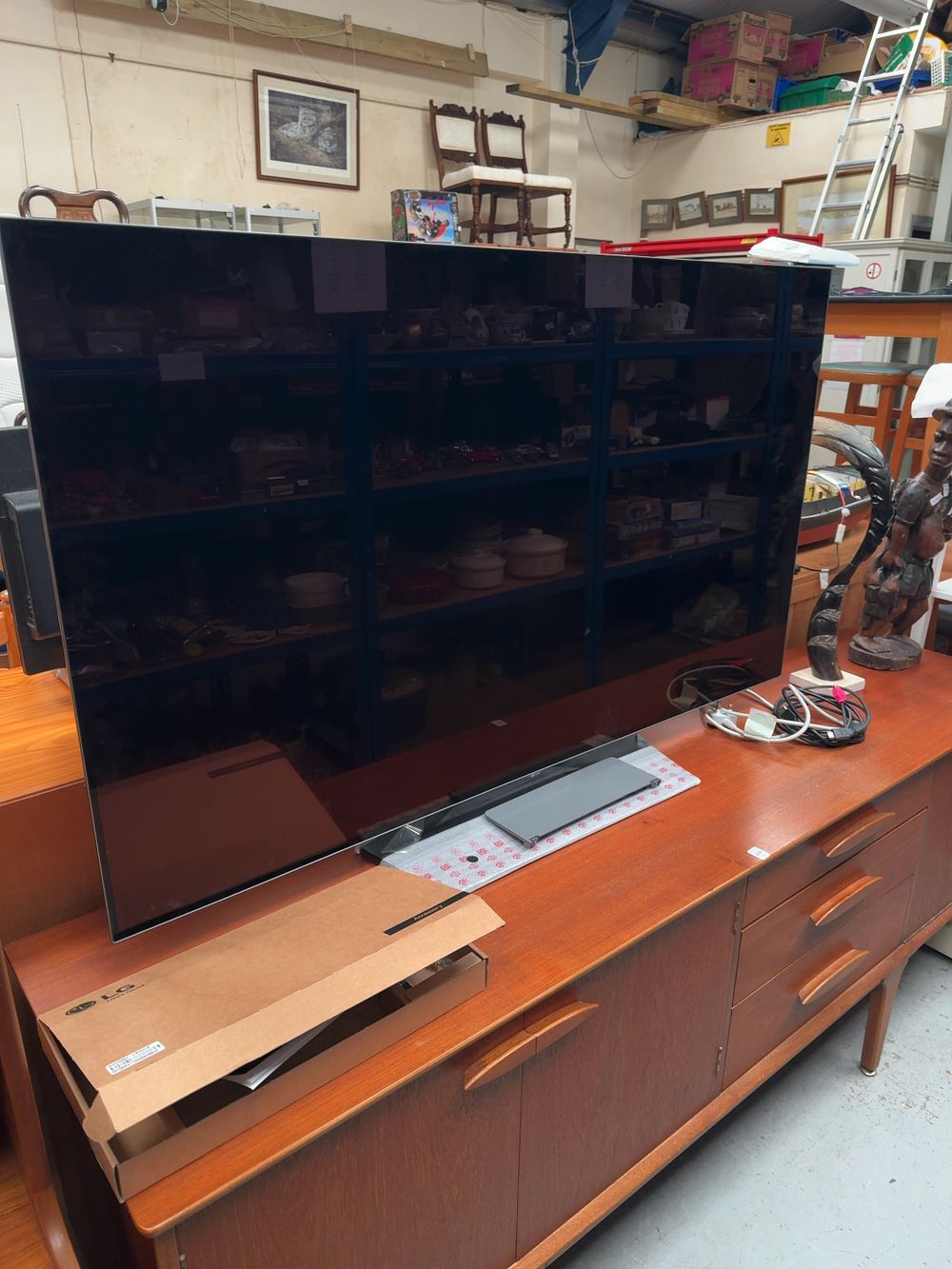 Lot 405: An LG 55-Inch OLED 4K Ultra HD Smart Television with Stand and Accessories