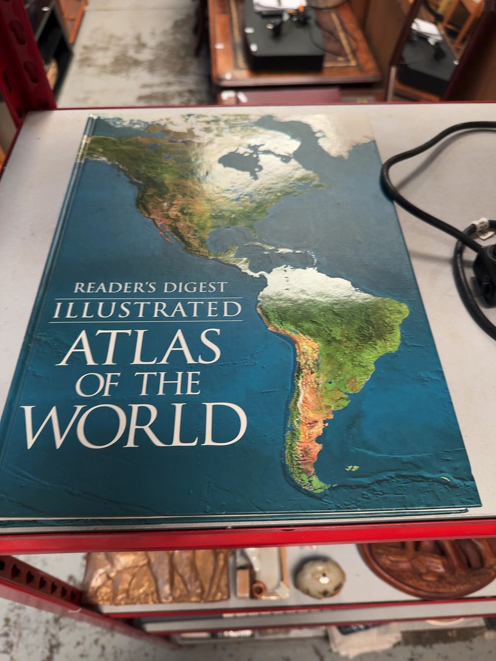 Lot 418: A Reader's Digest Illustrated Atlas of the World Hardcover Book