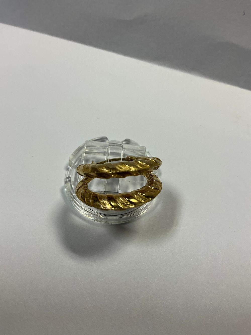 Lot 125: A Pair of Textured 9ct Yellow Gold Hoop Earrings