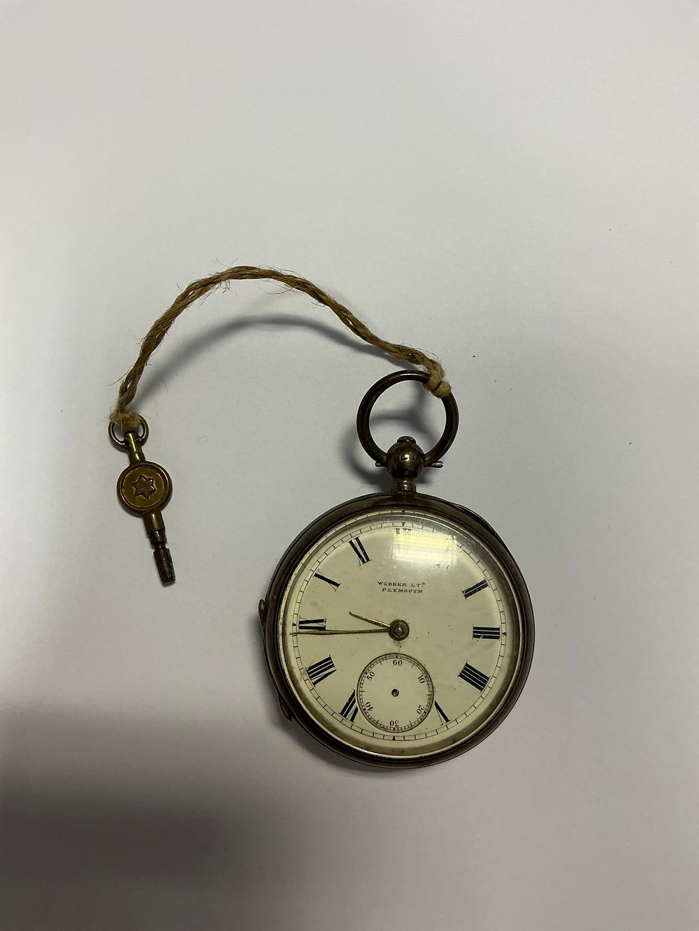 Lot 147: A Victorian Hallmarked Silver Open Face Pocket Watch with Winding Key