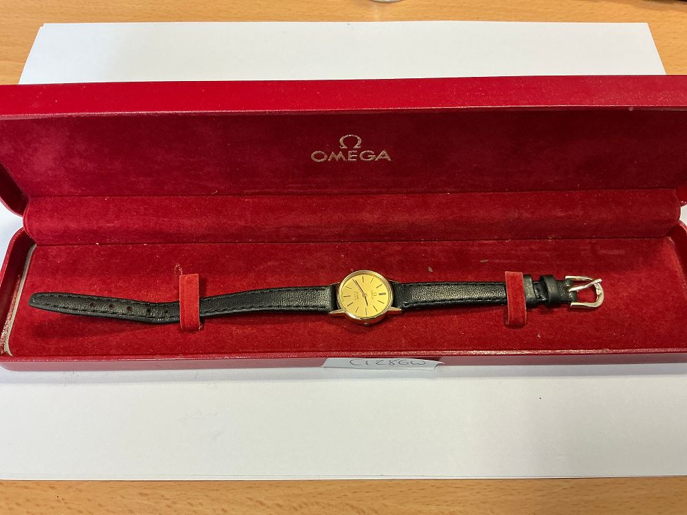 Lot 176: A Vintage Omega De Ville Quartz Wristwatch with Gold-Tone Dial in Presentation Case