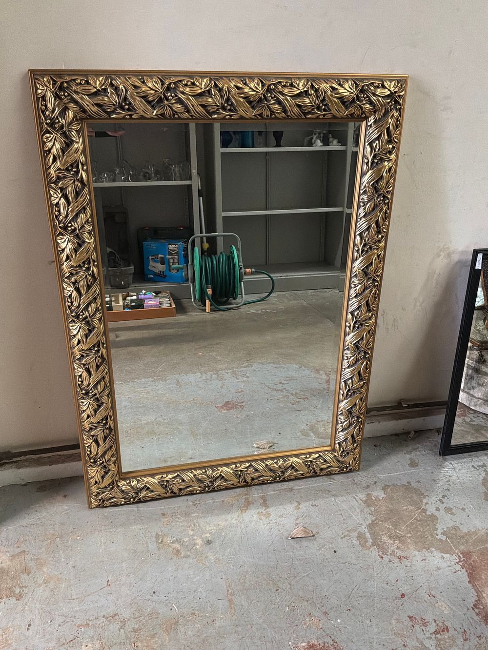 Lot 16: A Large Contemporary Gilt Style Foliate and Berry Framed Wall Mirror
