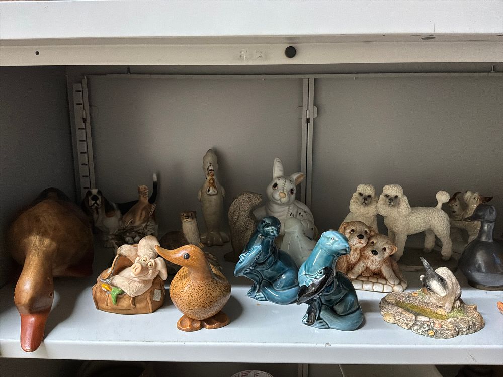 Lot 21: A Collection of Ceramic and Resin Animal Figurines Including Novelty Examples