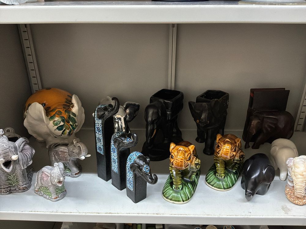 Lot 36: A Collection of Elephant Figurines in Various Styles and Materials