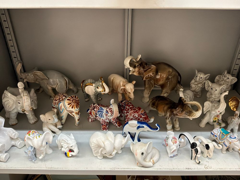 Lot 44: A Collection of Ceramic and Porcelain Elephant Figurines in Various Styles