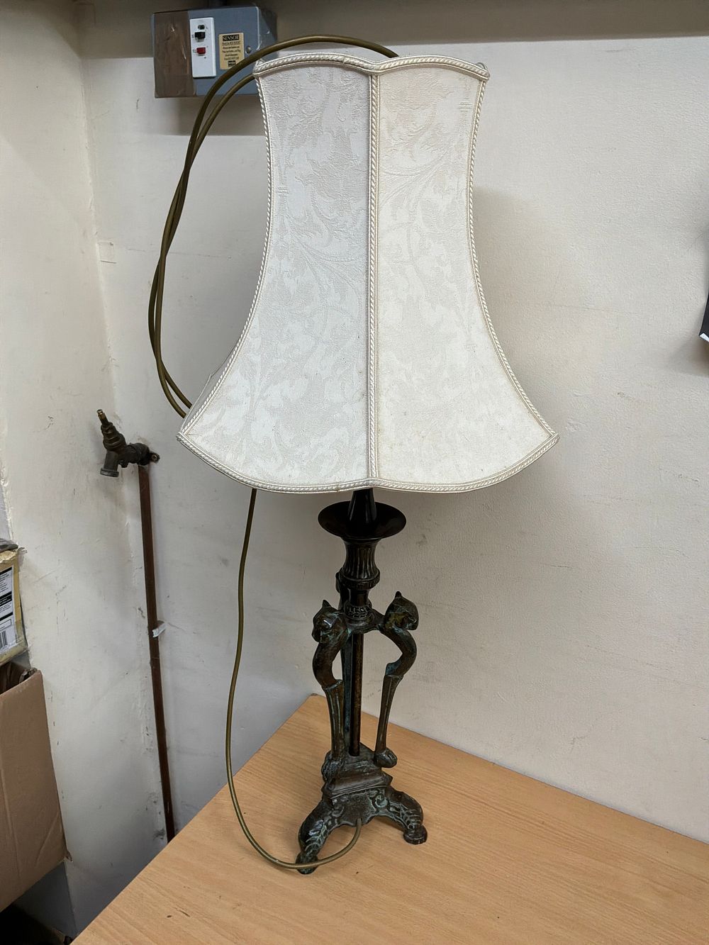 Lot 56: A Table Lamp with Cast Metal Zoomorphic Base and Damask Pattern Fabric Shade