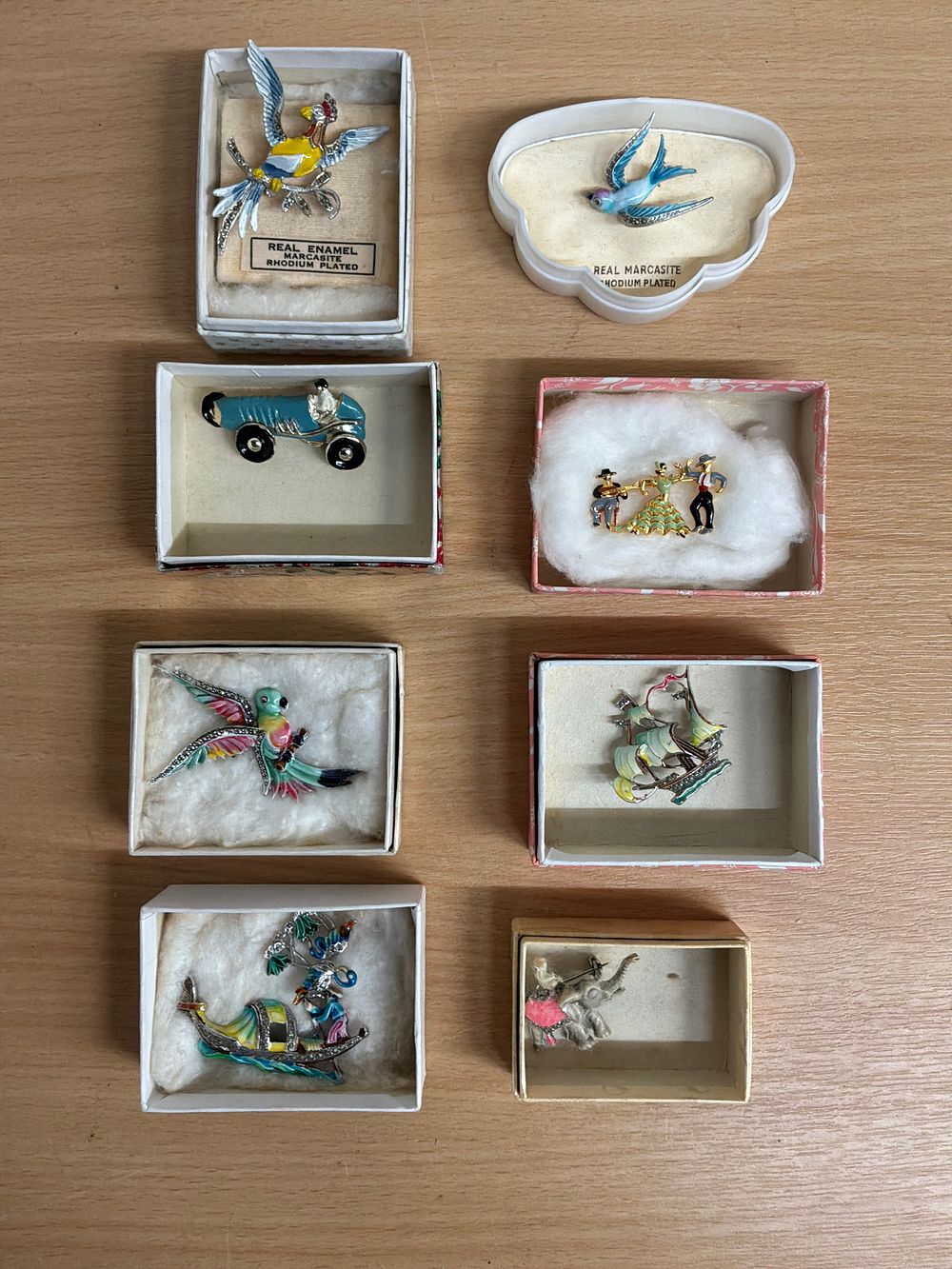 Lot 61: A Collection of Rhodium Plated and Enamel Marcasite Figurative Brooches
