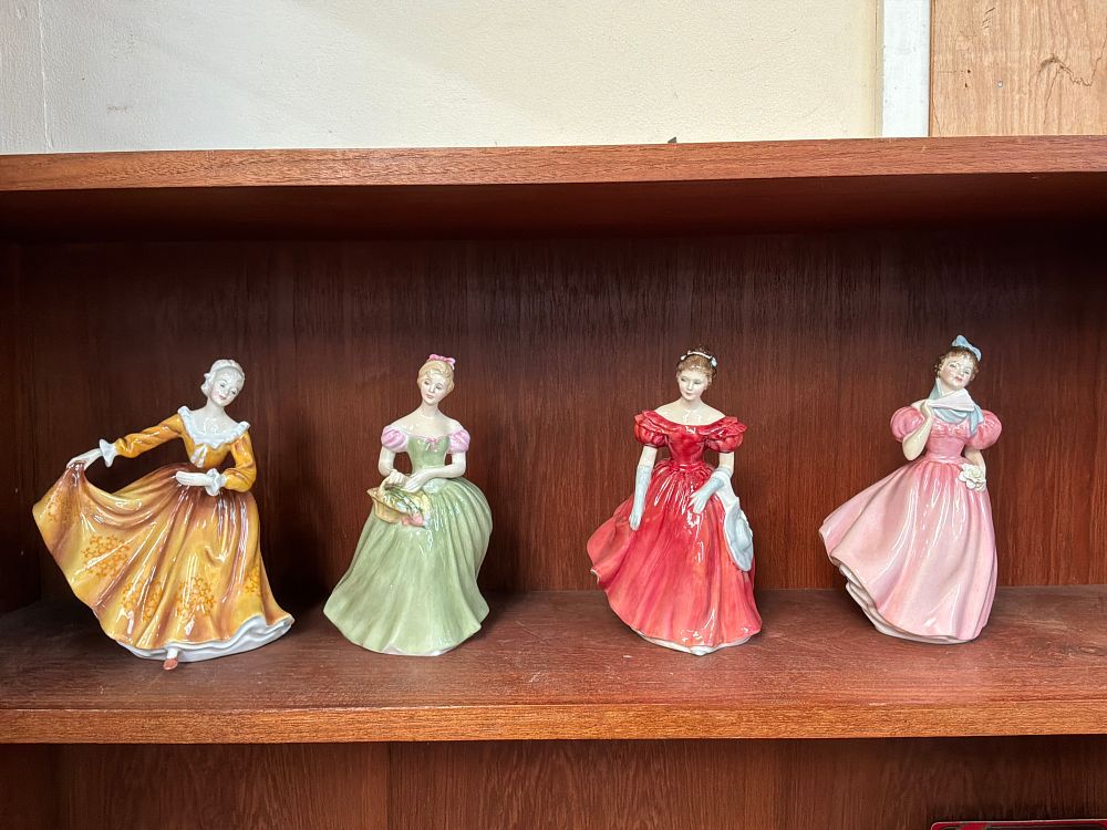 Lot 85: A Collection of Royal Doulton Bone China Figurines Including Kirsty, Clarissa, Winsome, and Camellia