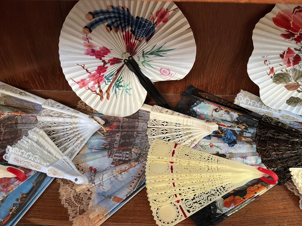 Lot 88: A Collection of Decorative Folding Hand Fans Including Asian and European Souvenir Styles