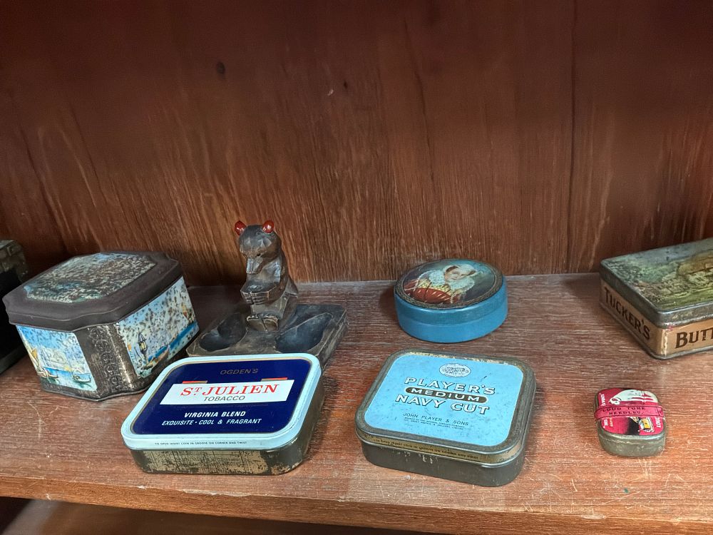 Lot 89: A Collection of Vintage British Advertising and Souvenir Tins Including Player's Navy Cut and HMV Examples