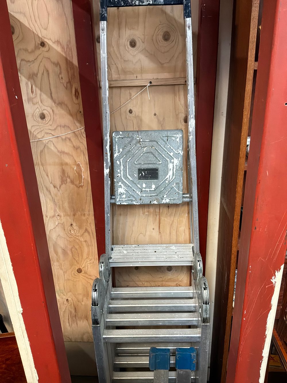Lot 92: A Multi-Position Folding Aluminium Ladder with Central Platform