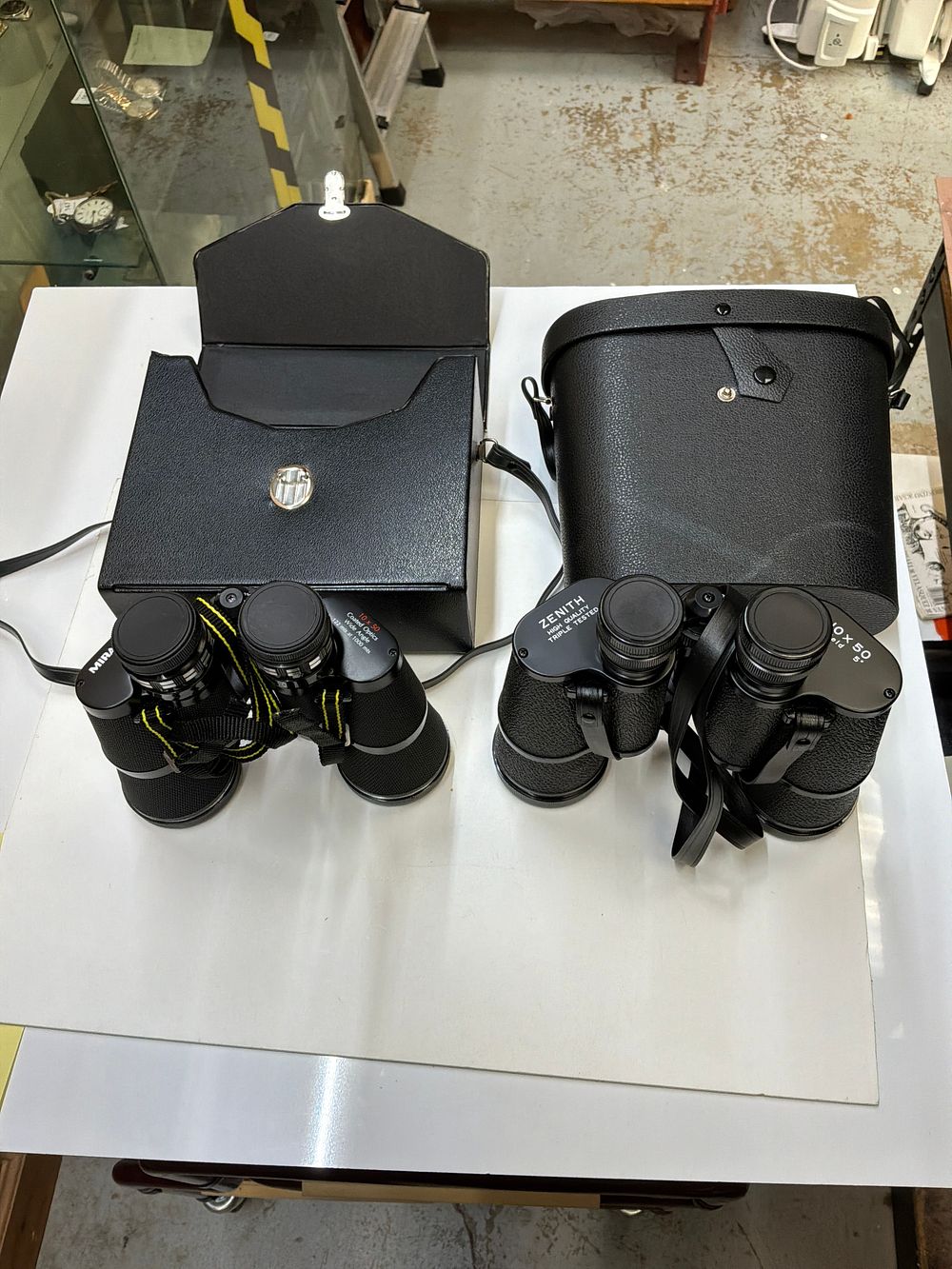 Lot 186: A Pair of Porro Prism 10x50 Binoculars including Zenith and Miranda Examples in Cases