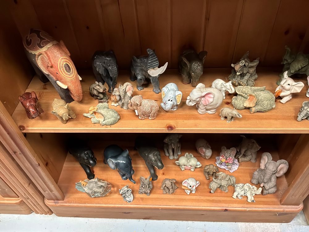Lot 200: A Collection of Elephant Figurines in Various Styles and Materials Including Ceramic and Stone Examples