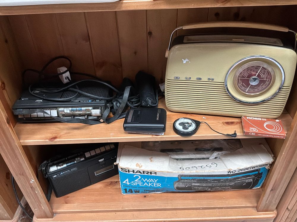 Lot 203: A Collection of Vintage Portable Radios and Cassette Recorders Including Bush, Sanyo, Sharp, and Sony Examples
