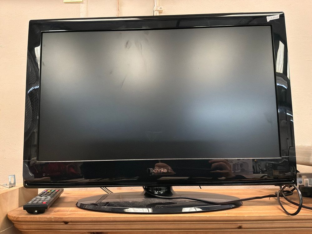 Lot 204: A Technika LCD Television With Remote Control and Attached Power Cable