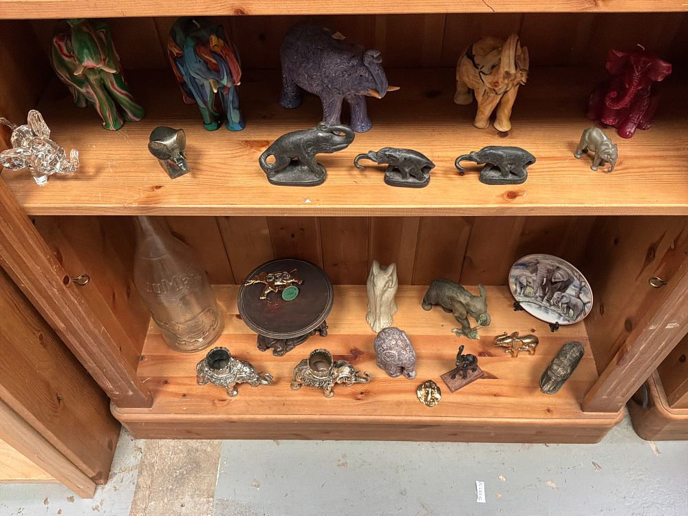 Lot 208: A Collection of Elephant Figurines and Themed Ornaments in Various Styles and Materials