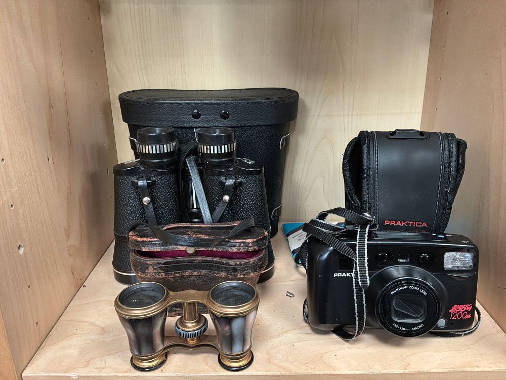 Lot 210: A Trio of Optical Instruments Including Praktica and Palomar Examples with Cases