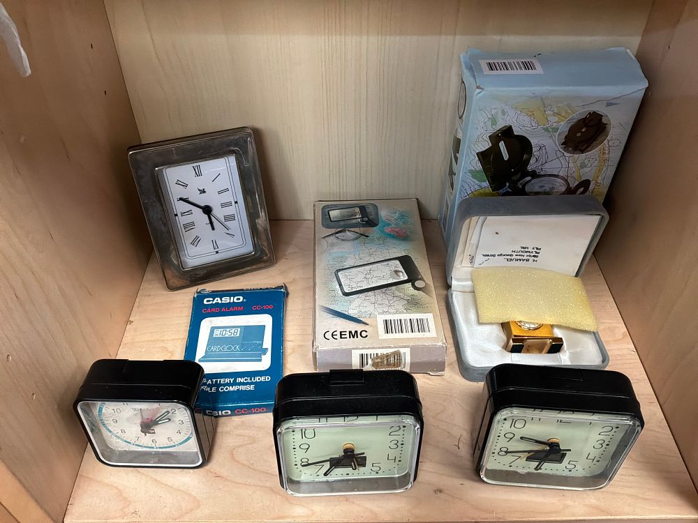 Lot 211: A Collection of Clocks and Horological Accessories Including Casio and H. Samuel Examples