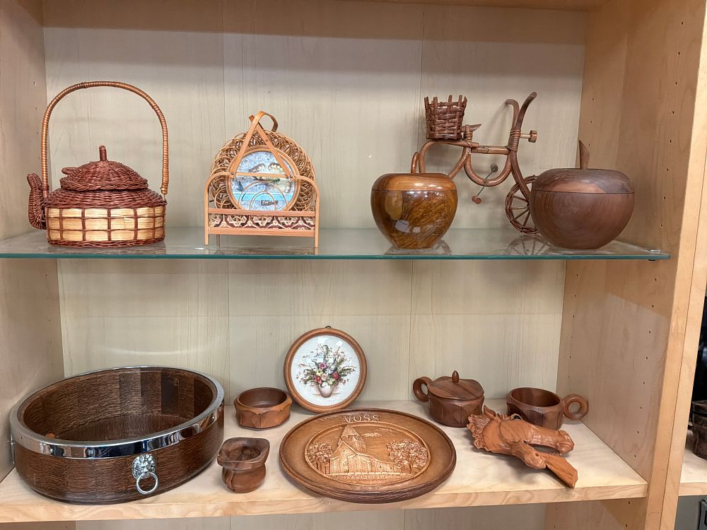 Lot 217: A Collection of Scandinavian style Wood and Woven Decorative Items Including a Voss Commemorative Plate