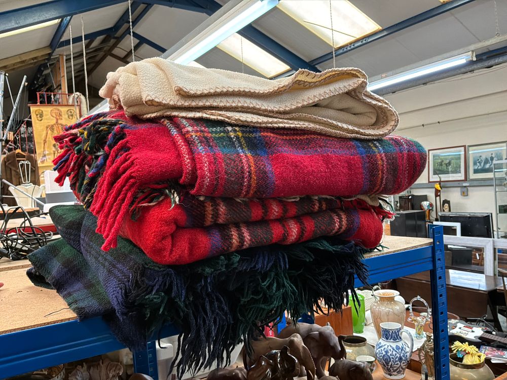 Lot 241: A Group of Three Vintage Wool Blankets and Tartan Travelling Rugs