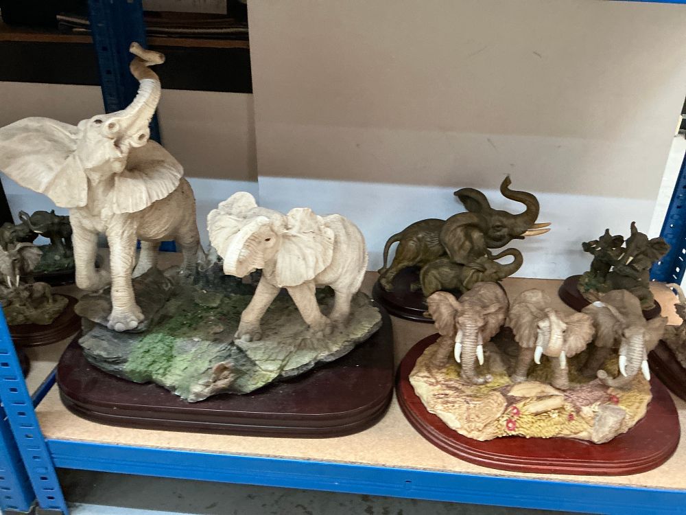 Lot 279: A Collection of Resin Elephant Figurines and a Novelty Clock including The Leonardo Collection Examples