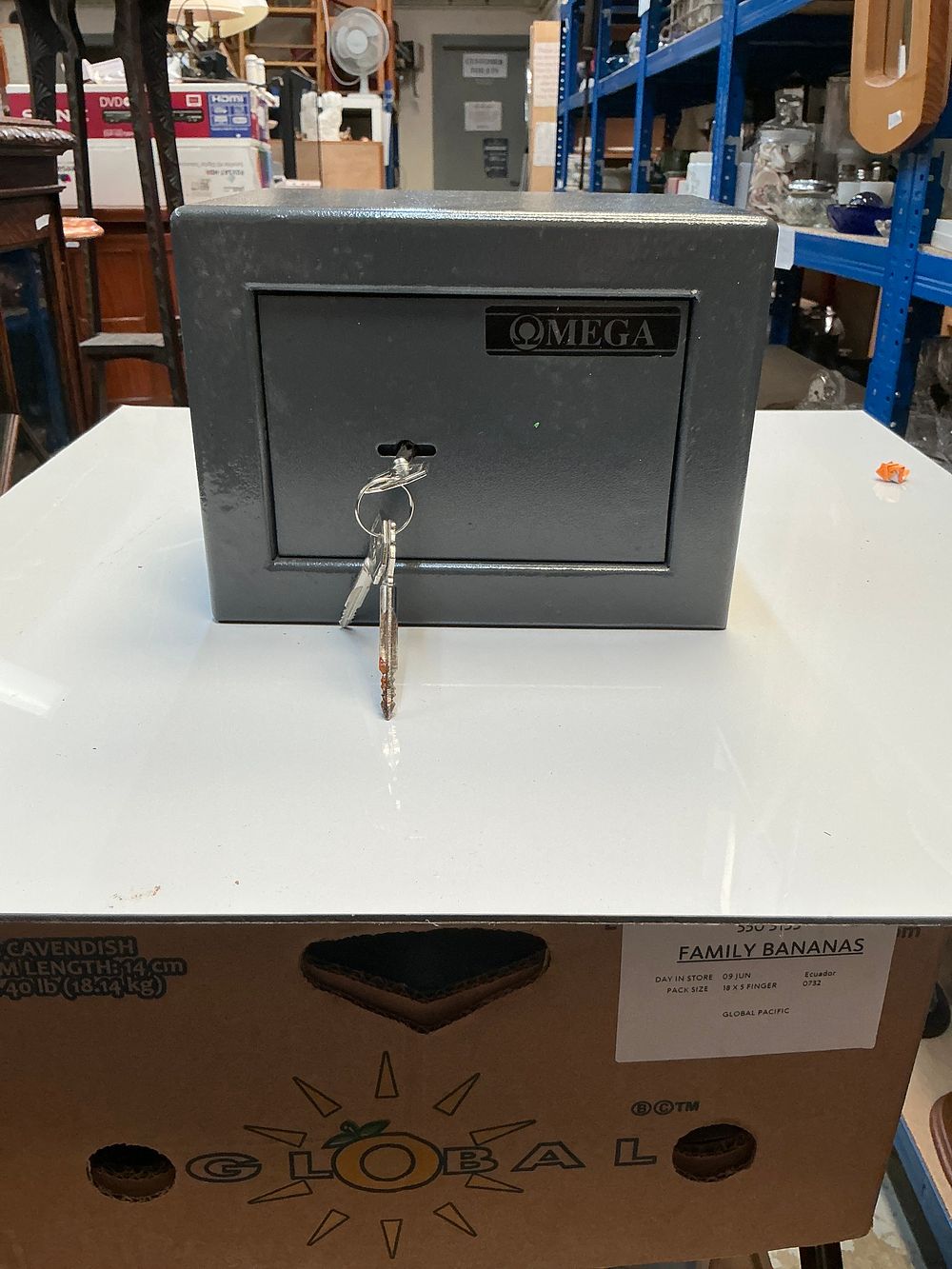 Lot 280: A Contemporary Omega Mini Vault Steel Security Safe with Keys and Manual
