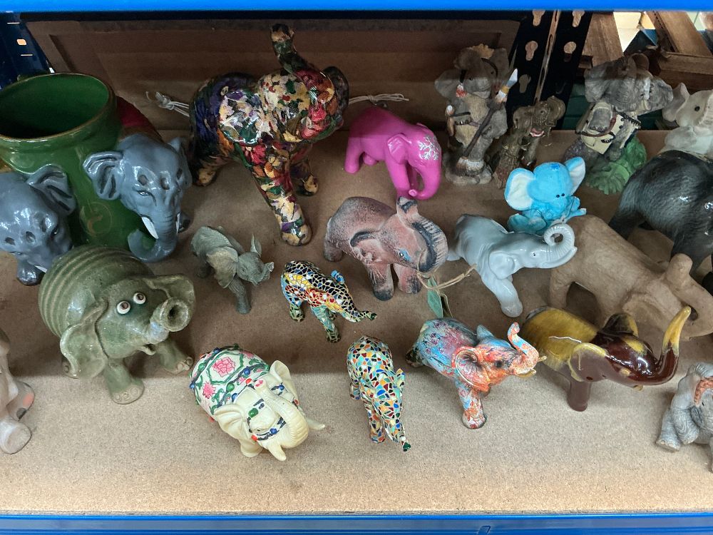 Lot 283: A Collection of Elephant Figurines and Decorative Objects in Various Materials and Styles
