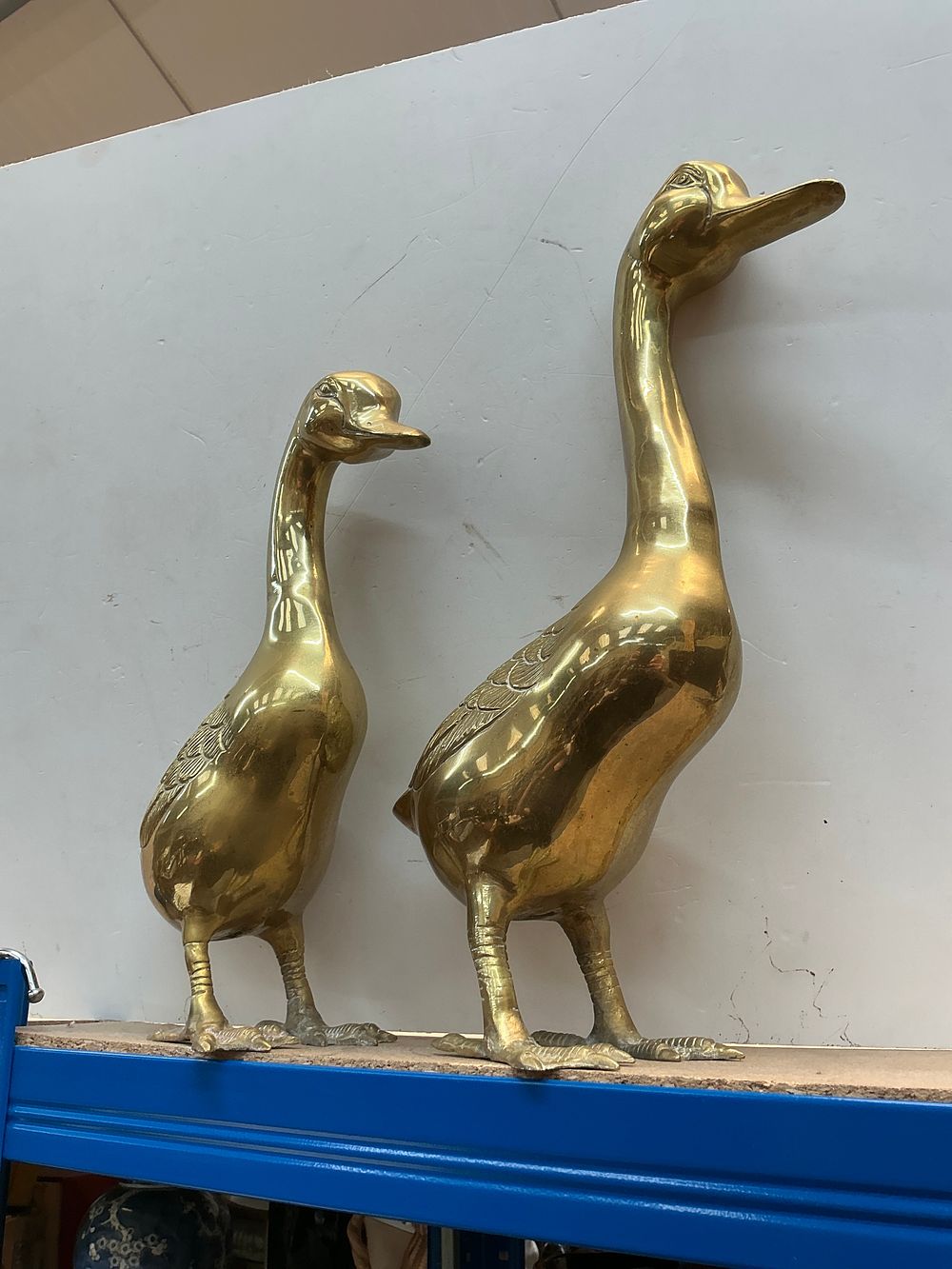 Lot 284: A Pair of Mid-Century Style Polished Brass Duck Figurines