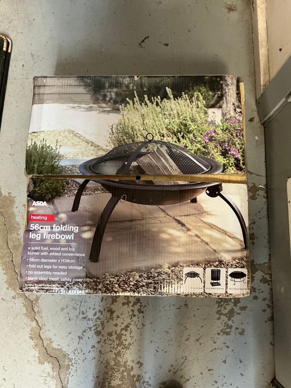 Lot 317: An ASDA Heating 56cm Folding Leg Firebowl in Original Box