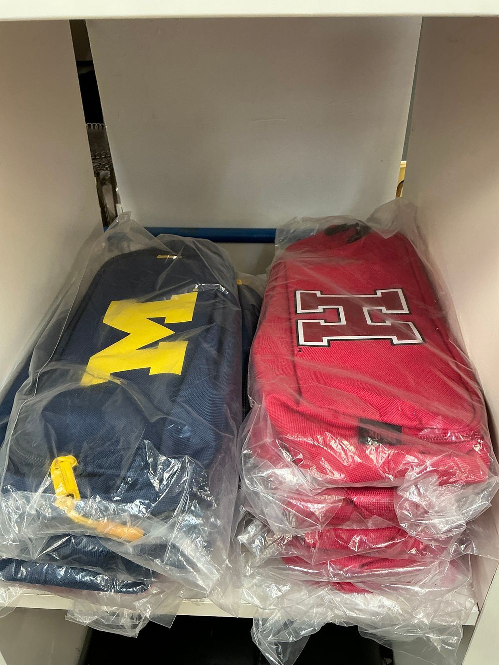 Lot 321: A Collection of Helix Synthetic Canvas University Utility Pouches Including Harvard and Michigan Examples