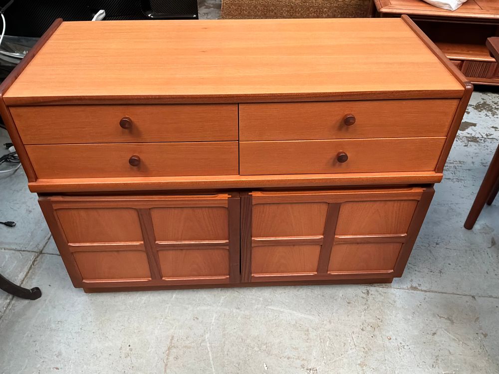 Lot 345: A Mid Century Modern Nathan Teak Sideboard with Four Drawers and Double Cupboard