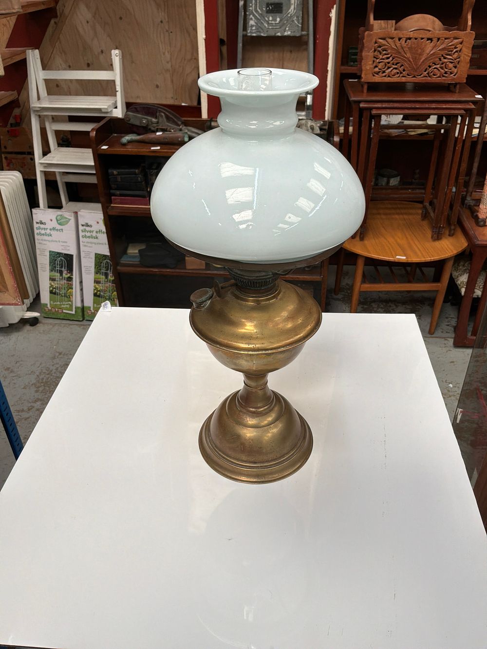 Lot 356: A Late Victorian or Edwardian Duplex Brass and Milk Glass Table Lamp