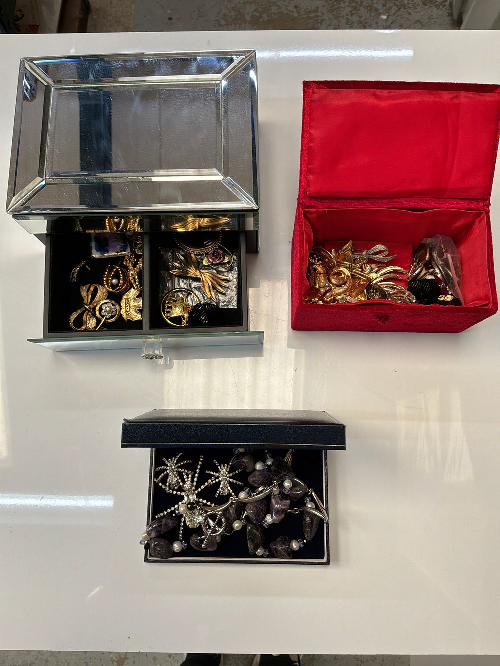 Lot 366: A Collection of Vintage and Contemporary Costume Jewellery including an RH Necklace in a Mirrored Glass Chest