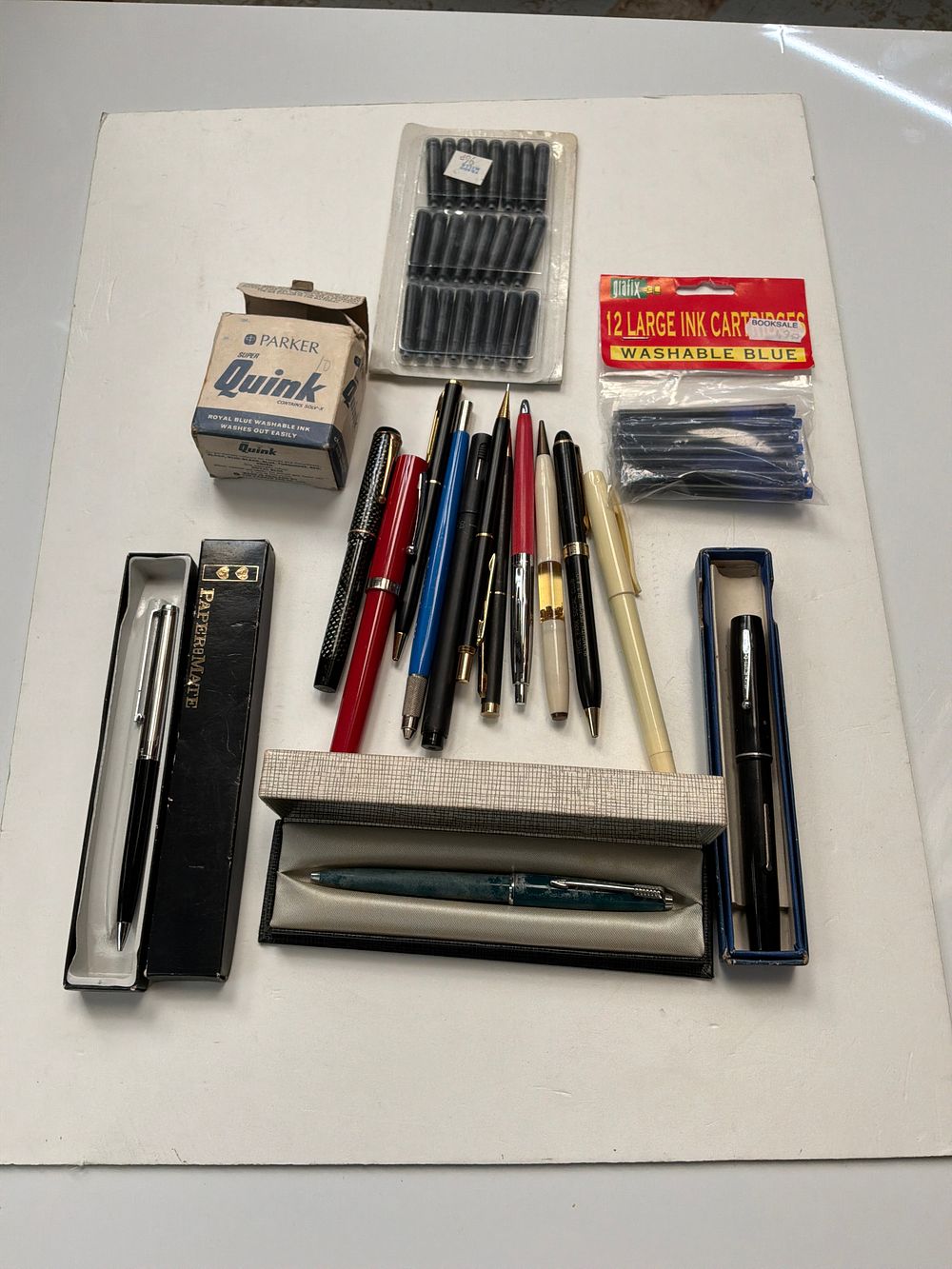 Lot 374: A Collection of Vintage Writing Instruments and Ink Accessories including Parker and Paper Mate Examples