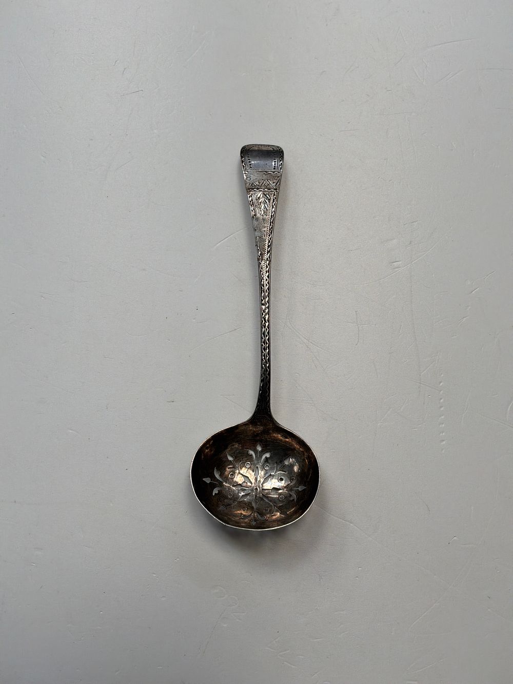 Lot 376: A George III Sterling Silver Sugar Sifter Spoon by Peter Podio