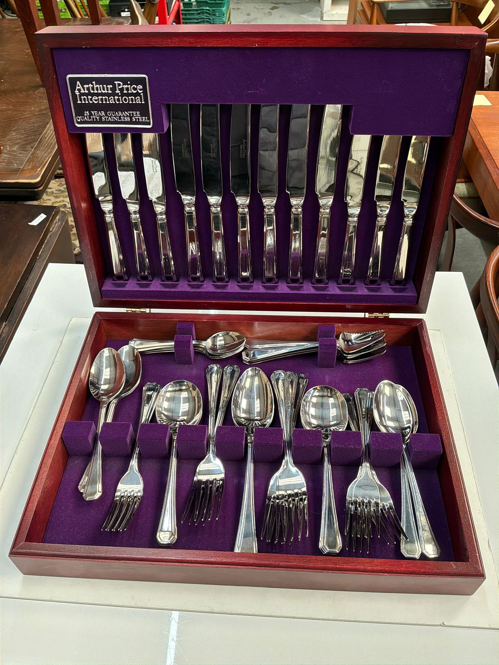 Lot 390: A Cased Arthur Price International Stainless Steel Canteen of Cutlery in Kings Pattern