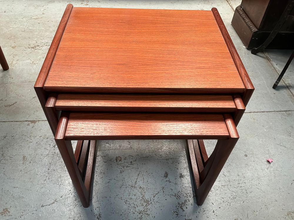 Lot 394: A Trio of Mid Century Modern Teak Nesting Side Tables by G Plan